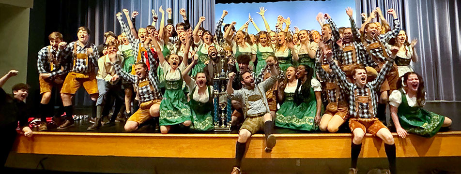 Blue Valley's ''BV Singers'' sweep the Harrisonville Show Choir Invitational in Missouri, along with best crew, costumes, and show design awards